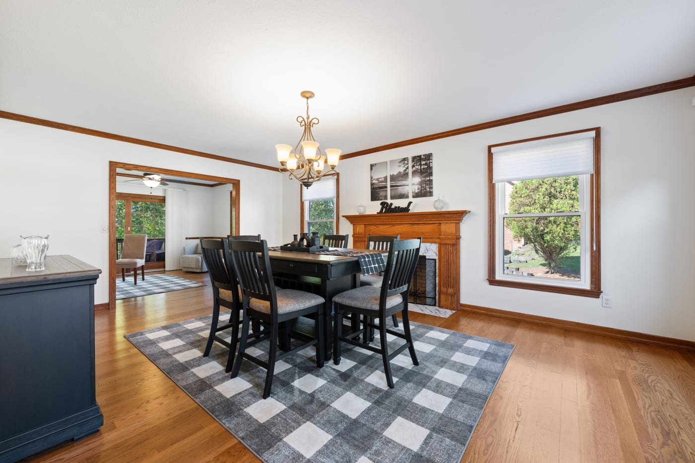 Distinctly patterned area rug beneath a dining table, showing the kind of texture that calls for specialist care