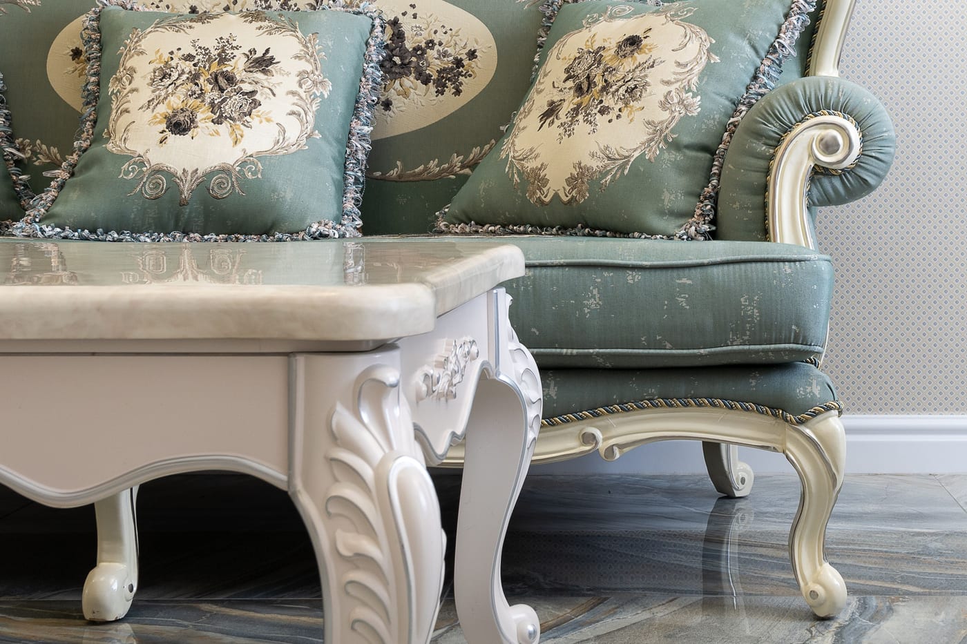 Delicate embroidered vintage-style sofa upholstery that requires specialized, gentle cleaning care